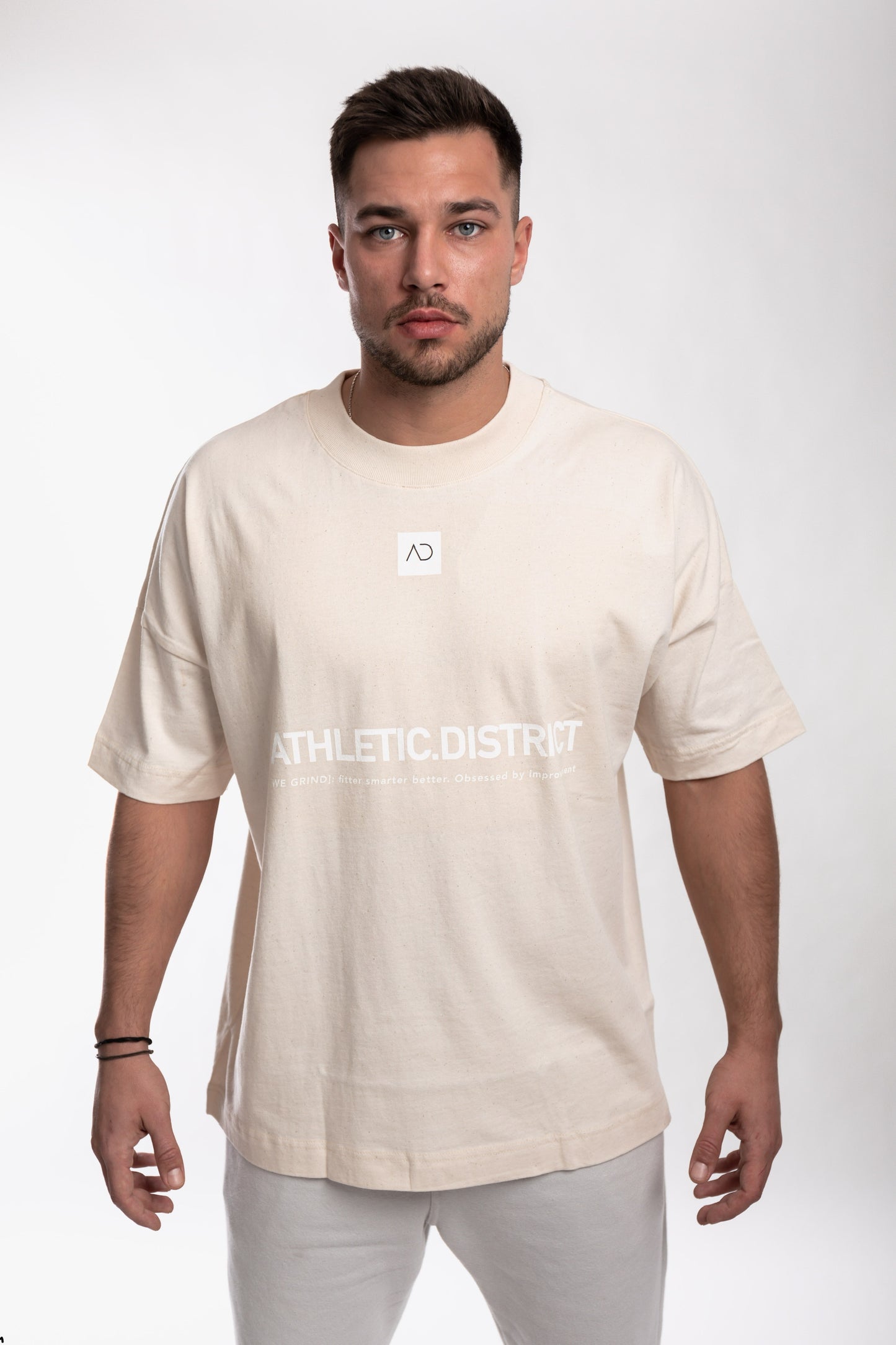 Athletic District - WE GRIND Kollektion - Organic Oversize T-Shirt-light brown white print