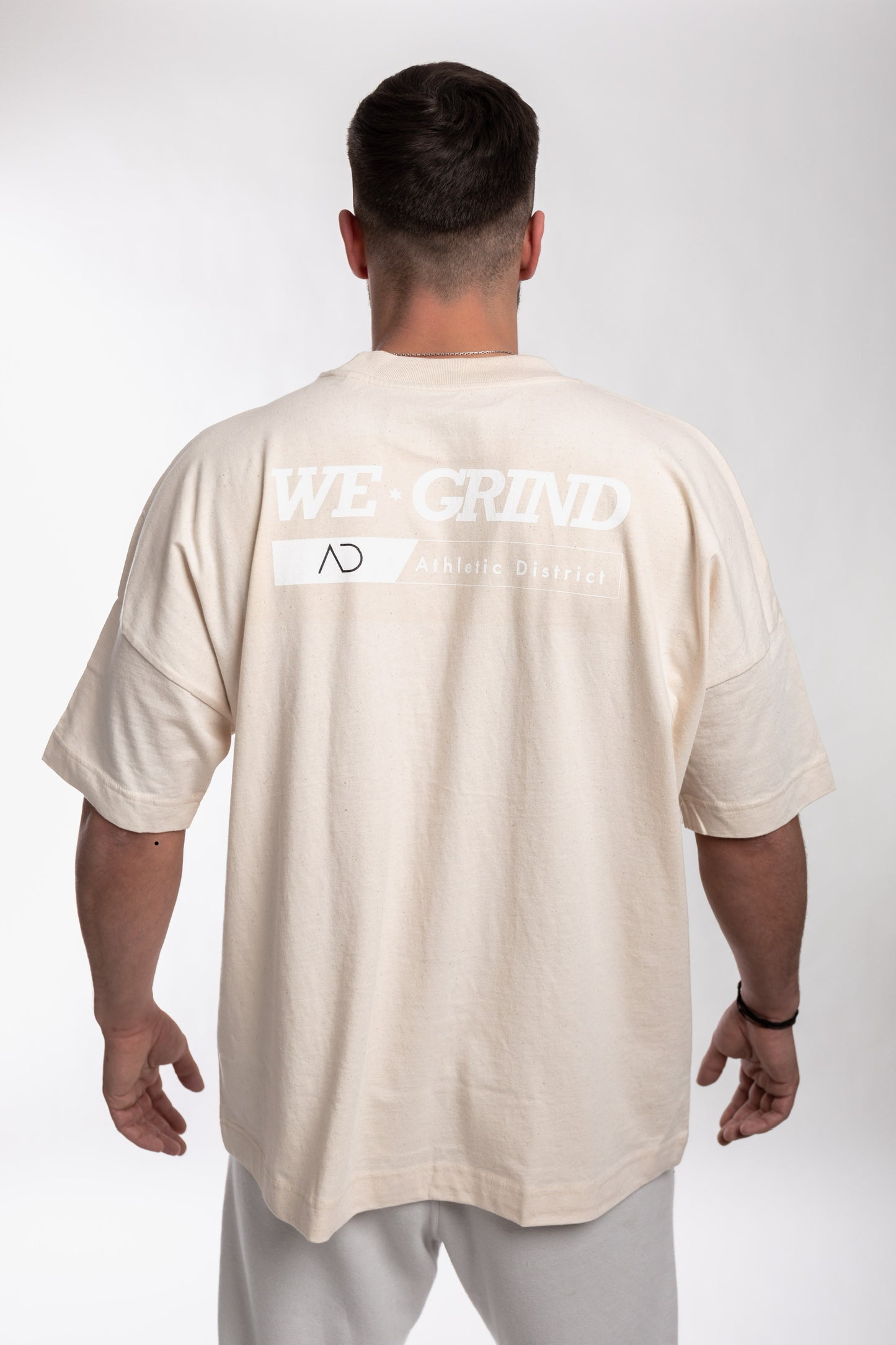 Athletic District - WE GRIND Kollektion - Organic Oversize T-Shirt-light brown white print